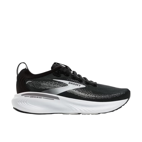Black and white running shoe with 'Brooks' branding on a white background