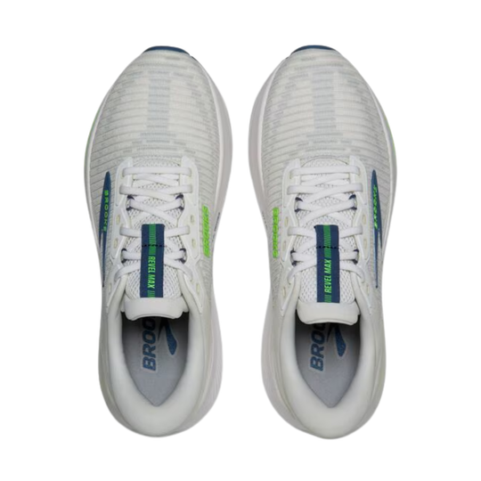 White running shoes with blue and green accents on a white background