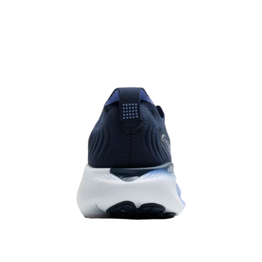 Navy running shoe with white sole on a white background