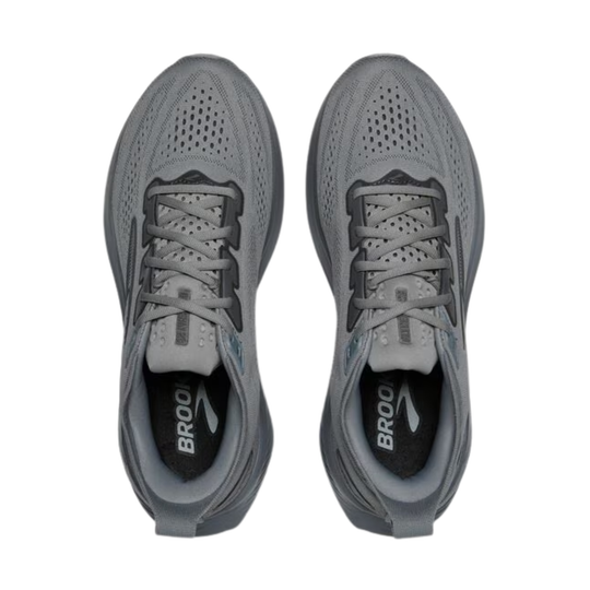 Pair of gray running shoes with 'Brook' branding on a white background