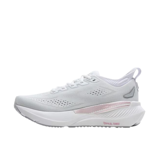 White running shoe with pink accents on a white background