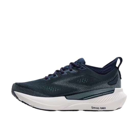 Navy running shoe with white sole on a white background