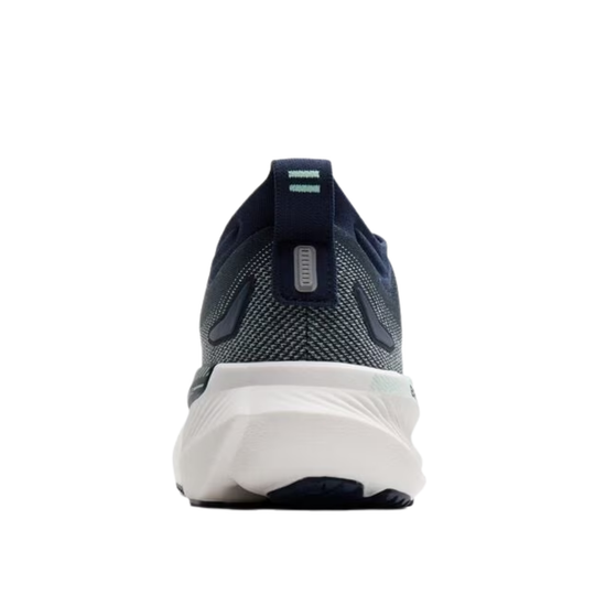 Navy running shoe with white sole on a white background