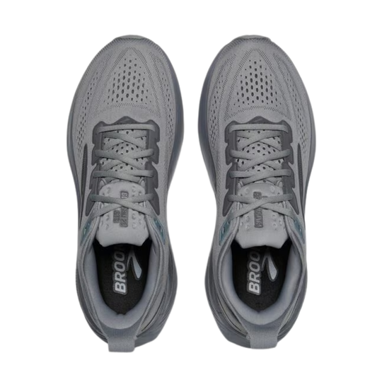 Pair of gray running shoes with 'Brooks' branding on a white background