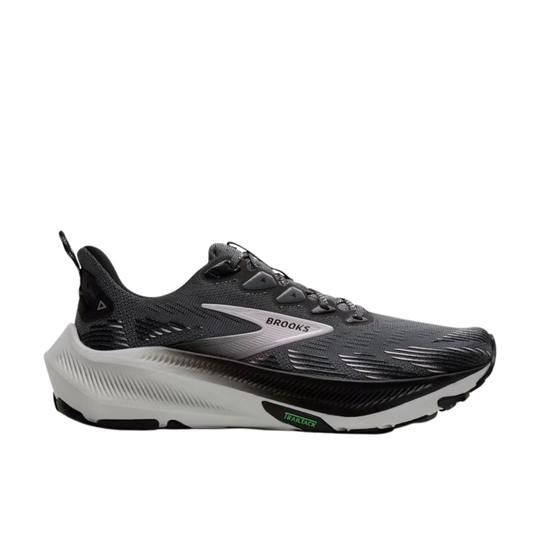 Black and white running shoe with 'Brooks' branding on a white background