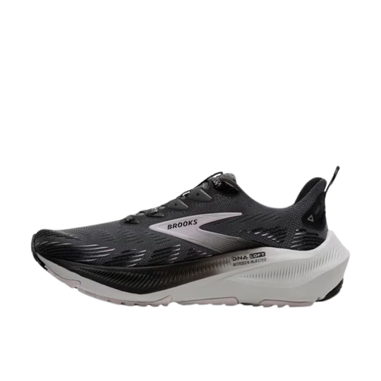 Black and white running shoe with 'Brooks' branding on a white background
