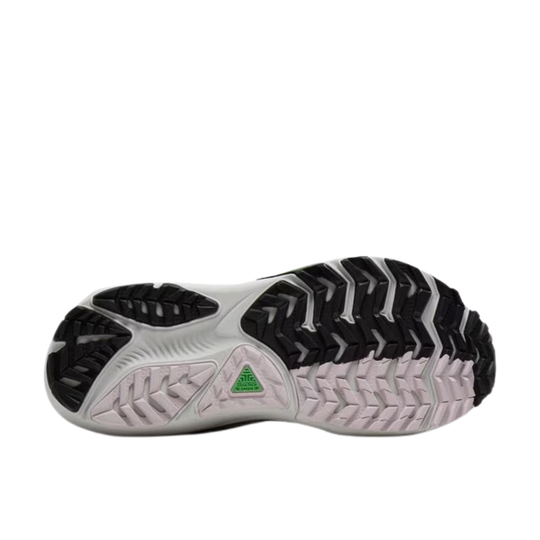 Close-up of a shoe sole with a brand logo on a white background