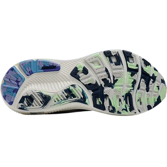 Close-up of a running shoe sole with patterned design on a white background
