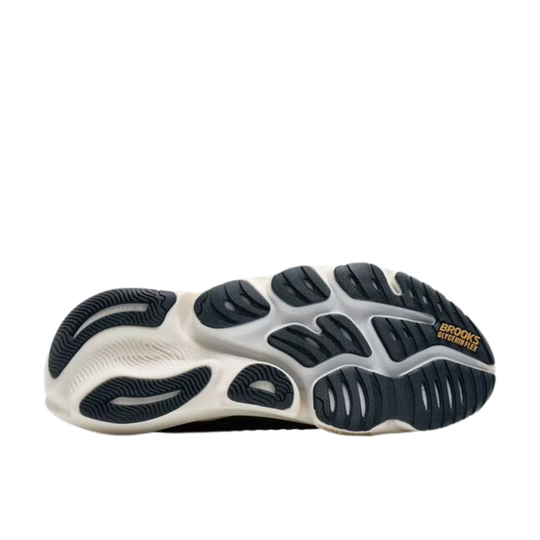 Sole of a running shoe with 'Brooks' branding on a white background