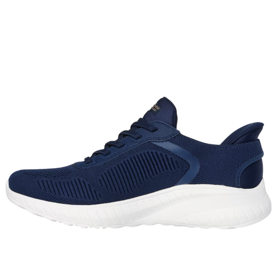 Navy blue athletic shoe with white sole on a white background