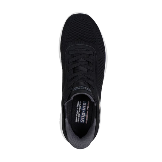 Black sneaker with brand logo on a white background