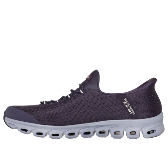 Purple sneaker with white sole on a white background