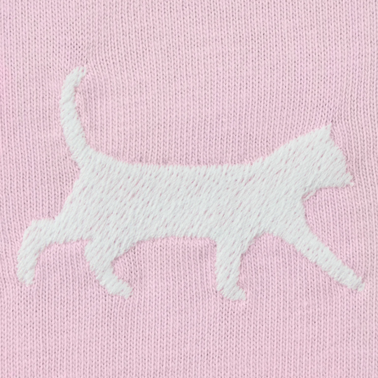White embroidered cat design on a pink fabric background