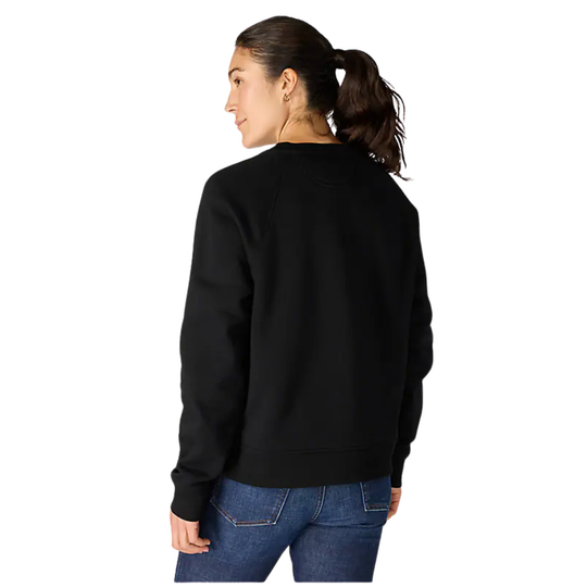 Person wearing a black sweatshirt and blue jeans on a white background