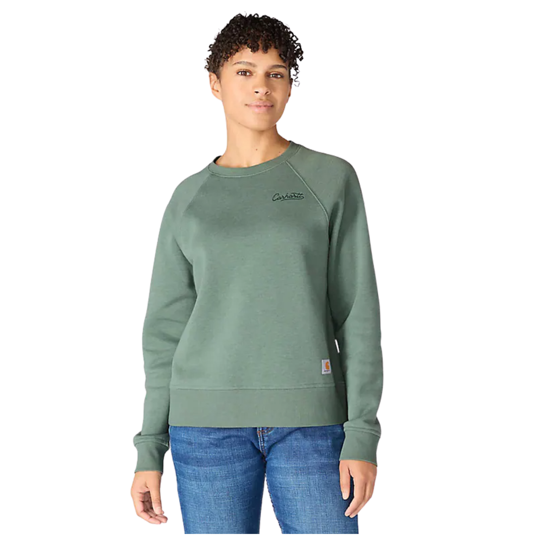 Person wearing a green sweatshirt with a brand logo on a white background