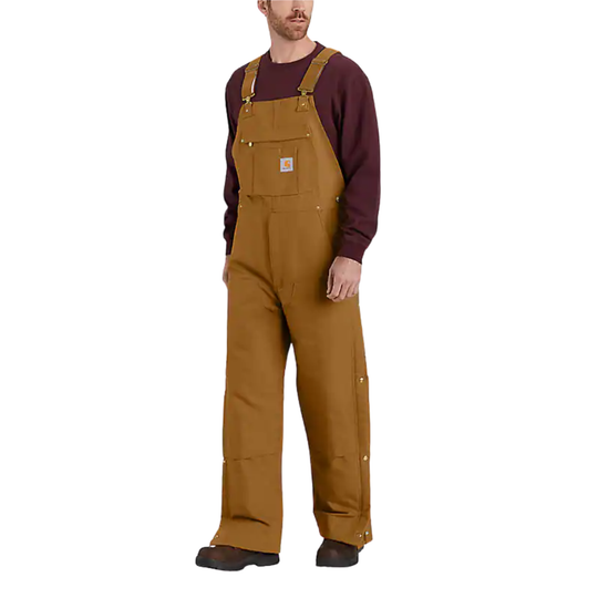 Man wearing brown bib overalls on a white background