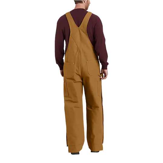 Person wearing brown bib overalls on a white background