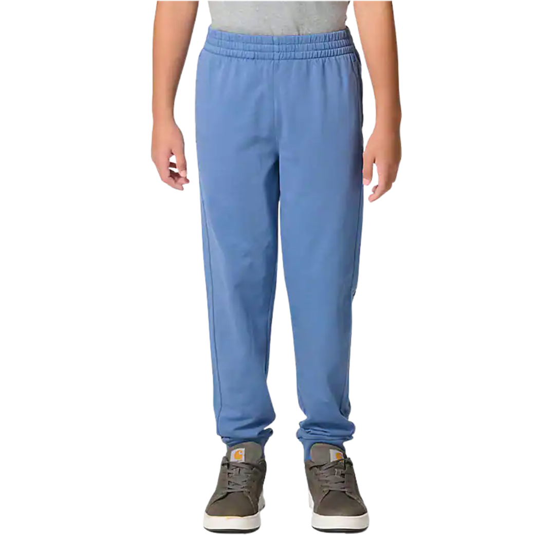 Person wearing blue sweatpants on a white background