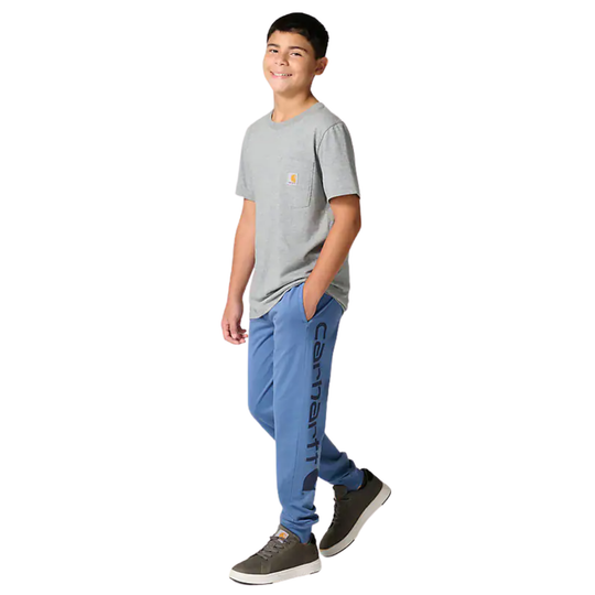Child wearing a gray t-shirt and blue pants with a brand logo on a white background