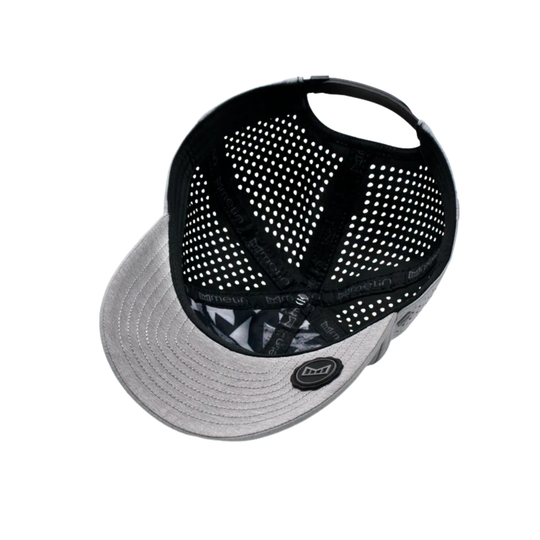Black and gray cap with mesh back on a white background
