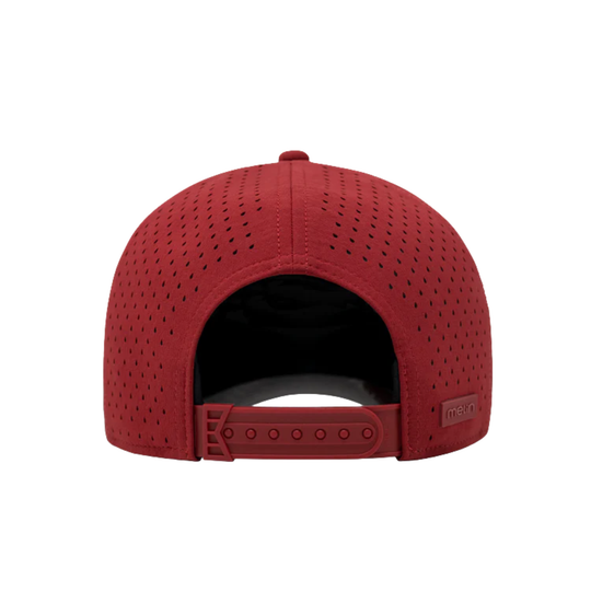 Red cap with perforated design on a white background
