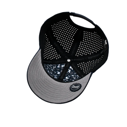 Black and gray cap with mesh design on a white background