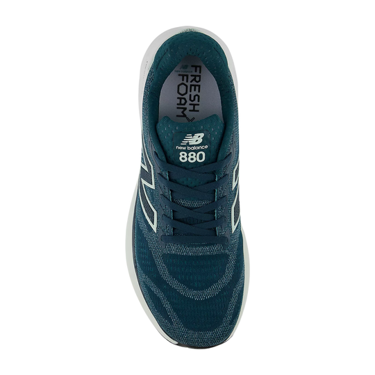 Teal running shoe with white side logo, lace-up upper, and visible Fresh Foam X 880 insole branding