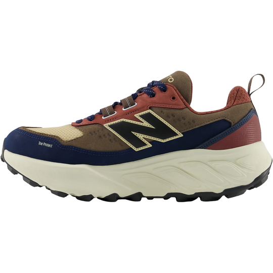 Brown and blue running shoe with New Balance logo on a white background