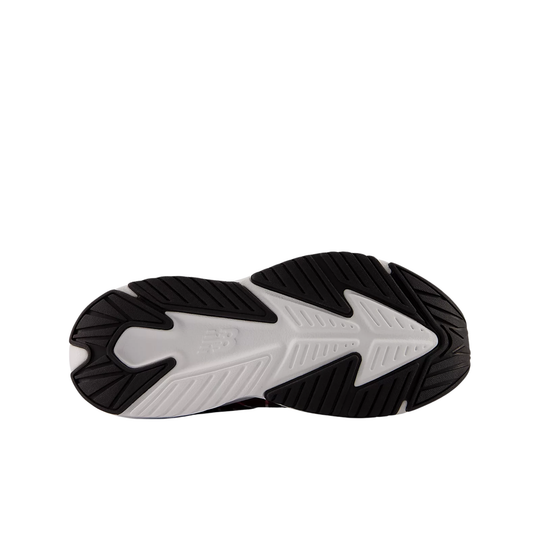 Black and white sneaker sole with a large arrow-shaped tread pattern