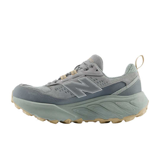 Gray sneaker with a visible brand logo on a white background