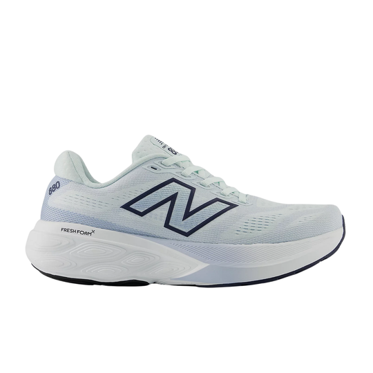 White low-top running shoe with navy logo and visible Fresh Foam text on the midsole
