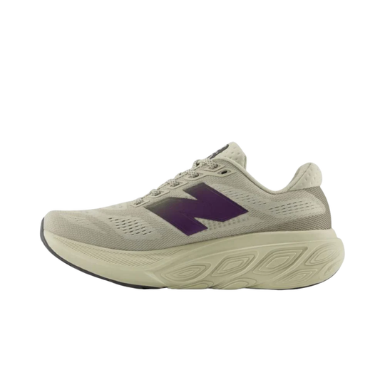 Beige running shoe with purple logo on a white background