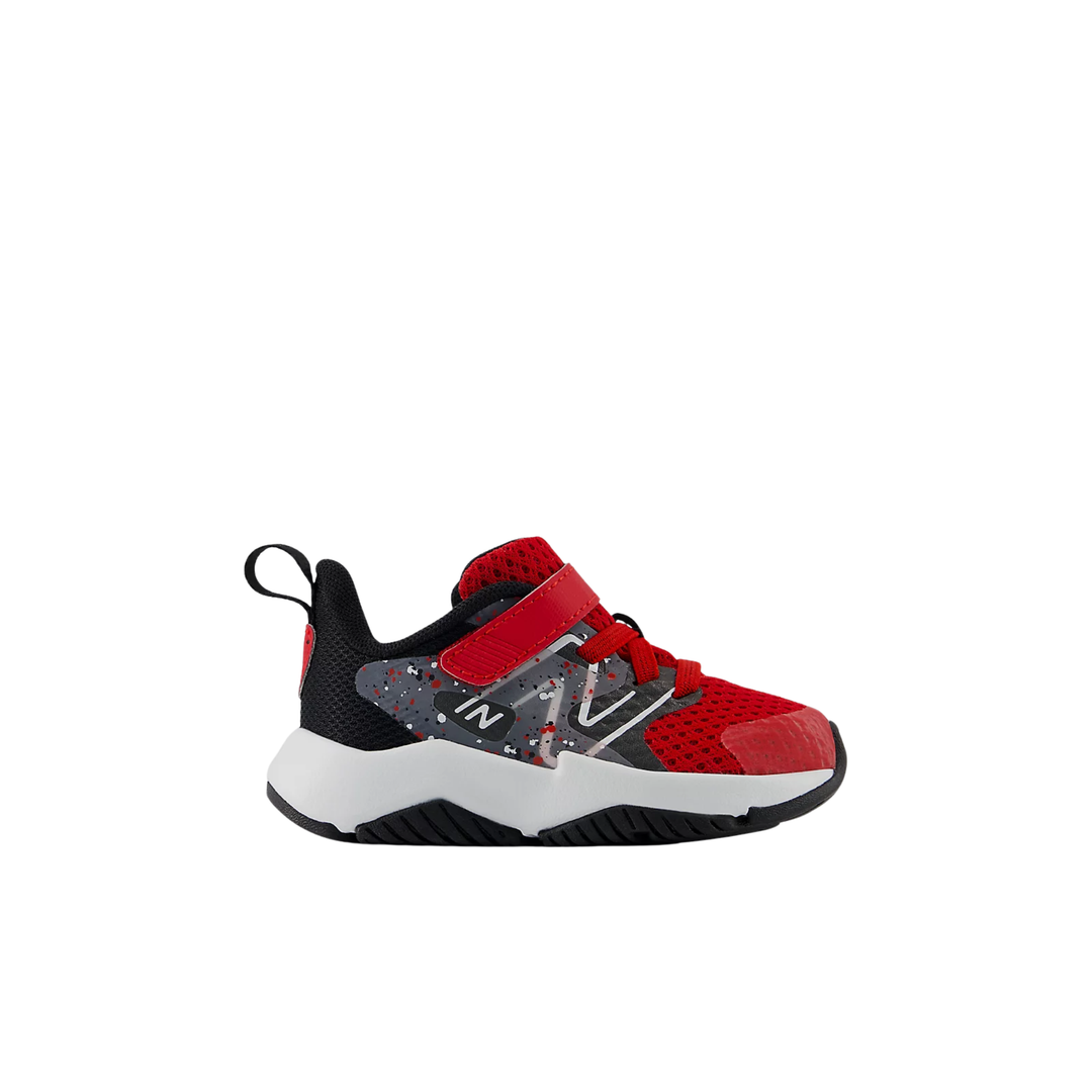 Red, black, and white sneaker on a white background