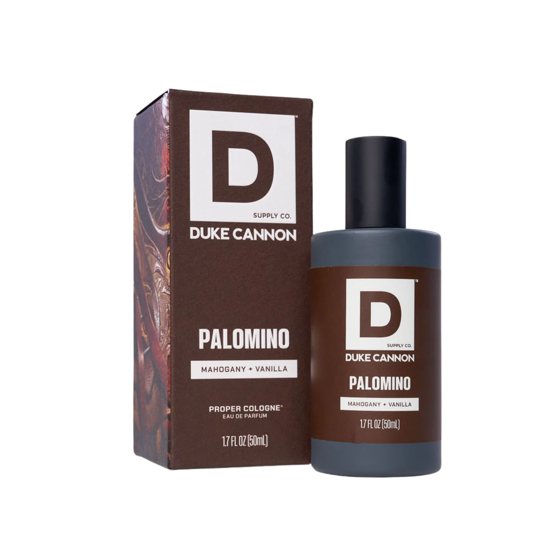 Brown cologne bottle and box with large D logo and Palomino text on a white background
