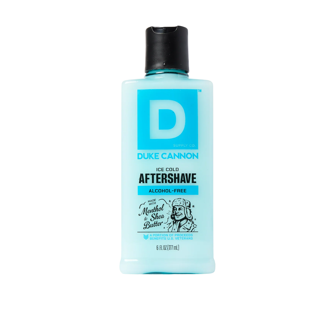 Light blue aftershave bottle with black cap and large D label on a white background