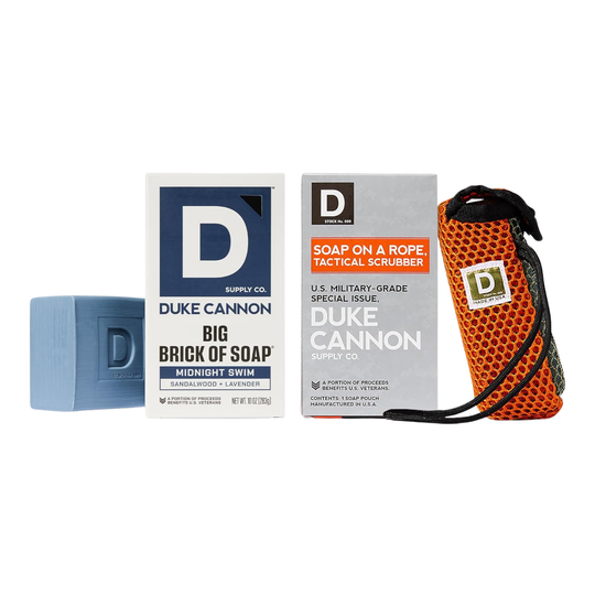 Duke Cannon soap packaging including a brick of soap, soap on a rope, and scrubber on a white background