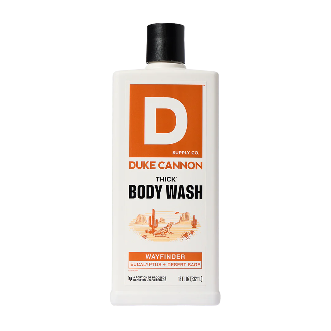 White body wash bottle with orange label, black cap, and bold THICK BODY WASH text