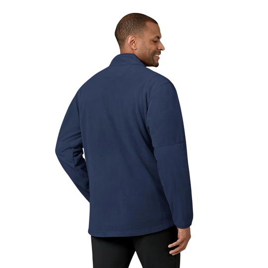 Man wearing a blue fleece jacket on a white background
