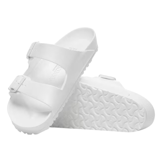 White sandals with textured sole on a white background