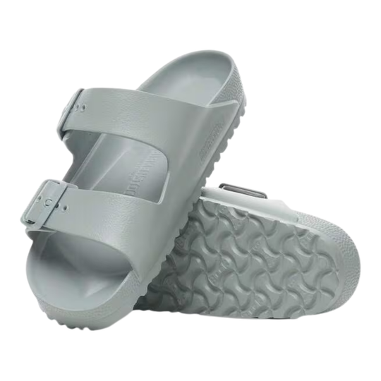 Gray sandal with a textured sole on a white background