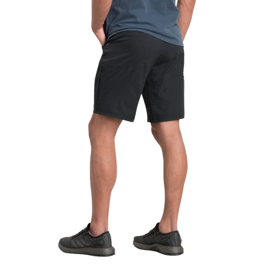 Person wearing black shorts on a white background