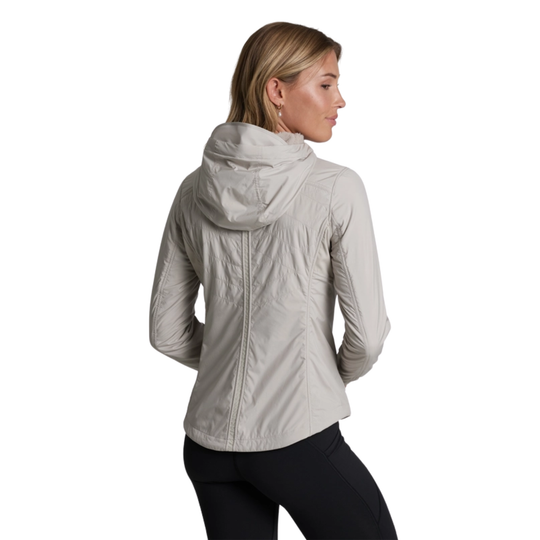 Woman wearing a light gray jacket on a white background
