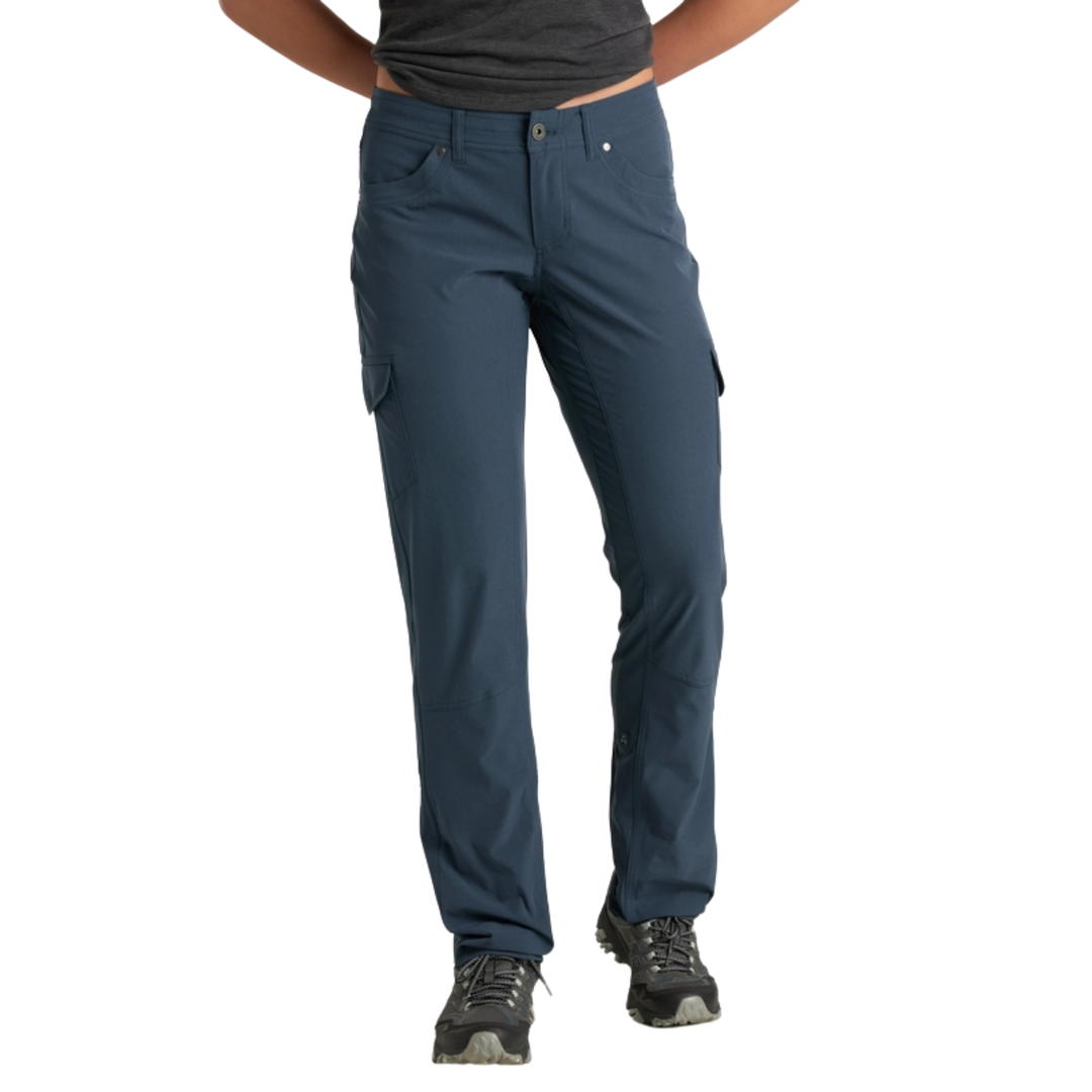 Blue cargo pants worn by a person on a white background