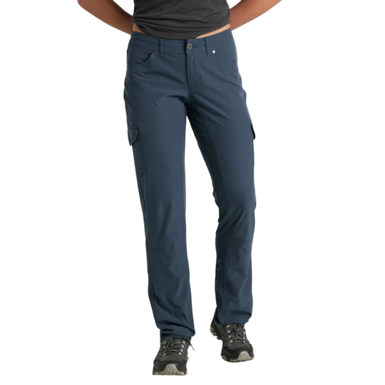 Blue cargo pants worn by a person on a white background