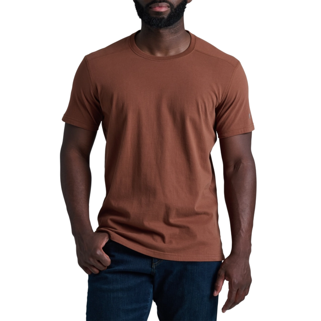 Man wearing a brown t-shirt on a white background
