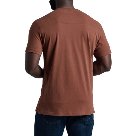 Person wearing a brown t-shirt on a white background
