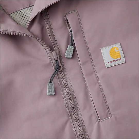 Close-up of a purple jacket with a Carhartt logo on a matching background