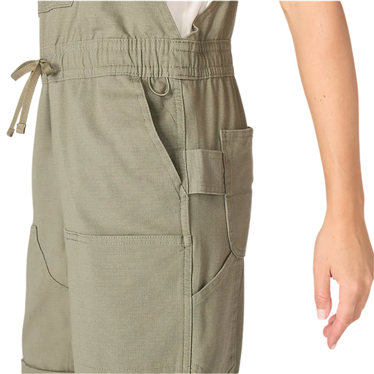 green shortall with multiple pockets on a white background