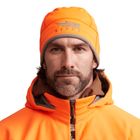 Man wearing an orange hunting jacket and hat with a brand logo on a white background