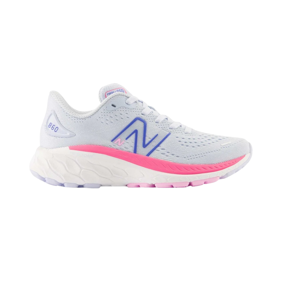 White running shoe with pink sole on a white background